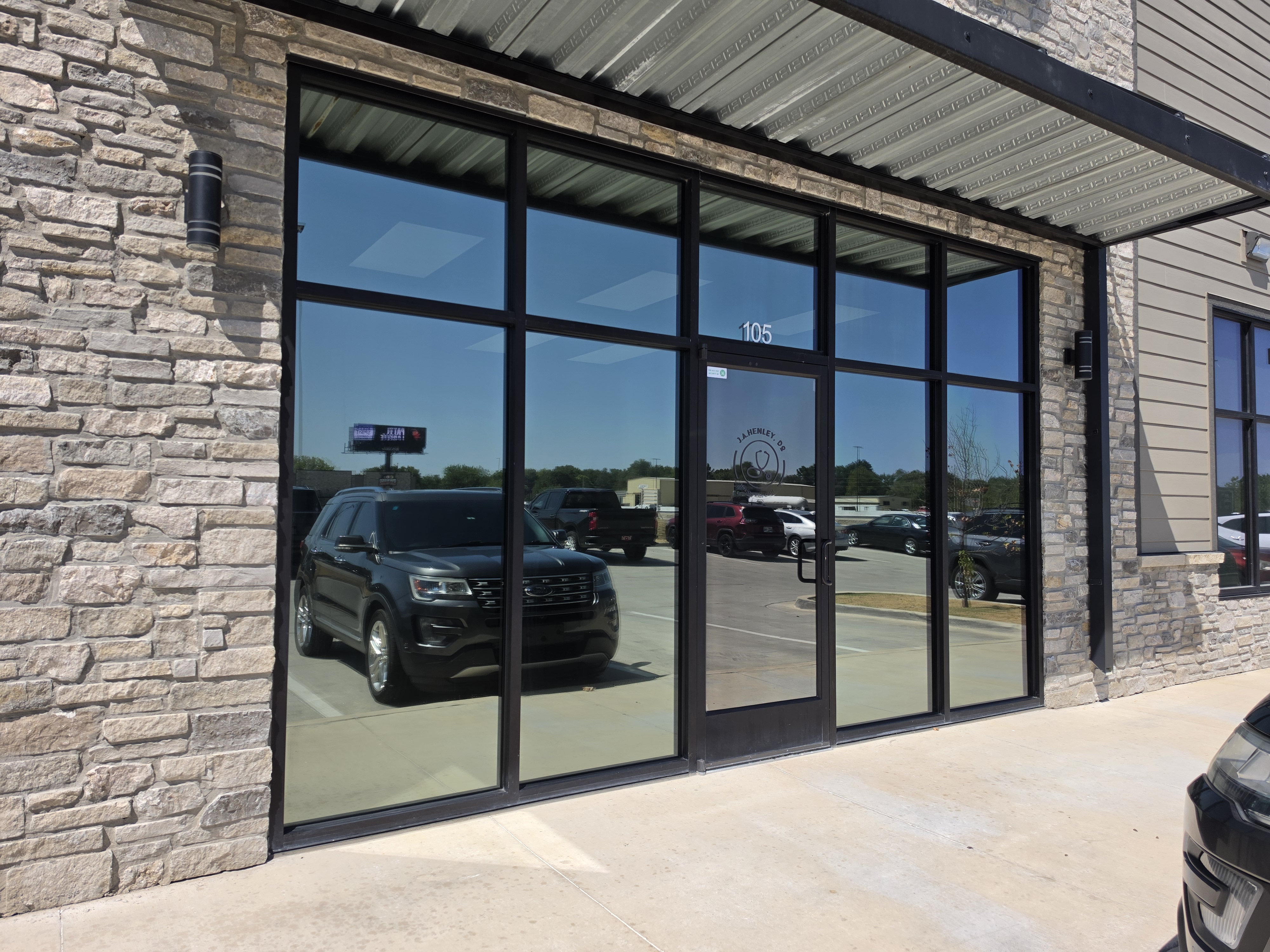 Tinted commercial storefront windows in Tulsa